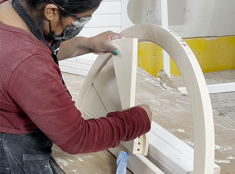 Woman Building Shutters